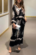 Ensemble unique avec haut à manches longues irrégulières et pantalon long