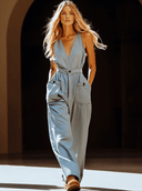 Lässiger Retro-Jumpsuit aus grau-blauem Tencel-Jeansstoff mit Taschen