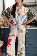 Conjunto de camisa holgada de manga corta con estampado único y pantalones con cintura elástica