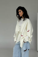 Cardigan a maglia con scollo a V e motivo bassotto