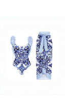 Blauwe eendelige bikini met handgemaakte applicatie