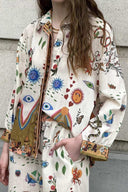 Conjunto de pantalones holgados oversize con estampado étnico destacado