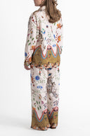 Conjunto de pantalones holgados oversize con estampado étnico destacado