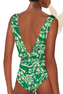 Traje de baño de una pieza verde con estampado y apliques florales