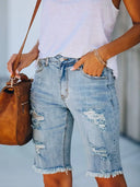 Pantaloni scurți din denim cu talie joasă, croială slim, tiv franjurat și aspect uzat