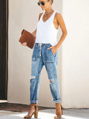Pantaloni di jeans strappati con coulisse autunnali
