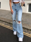 Flared Jeans mit Used-Look, weit geschnitten