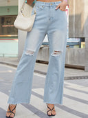 Jeans vintage evazați cu talie largă și rupturi