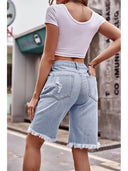 Shorts in denim lavato slim fit con effetto usurato da 5 pollici