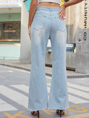 Jeans vintage evazați cu talie largă și rupturi