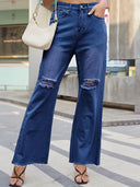 Jeans vintage evazați cu talie largă și rupturi