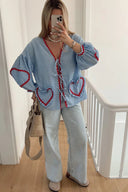 Blusa a maniche lunghe con cuori
