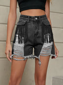 Shorts di jeans lavati con frange