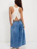 Plisserede jeans med knapper foran