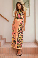 Conjunto de cárdigan de cuello halter con estampado llamativo y falda