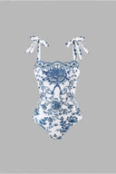 Conjunto de traje de baño de una pieza con moño floral