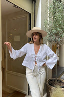 Blusa elegante e semplice con lacci