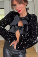Giacca con paillettes e nodo frontale