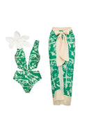 Traje de baño de una pieza verde con estampado y apliques florales