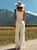 Damen-weißer Leinen-Jumpsuit ohne Ärmel mit Trägern, Knöpfen und Spitzen-Design