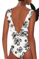 Traje de baño blanco de una pieza con estampado y apliques florales