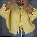 Cardigan con fiocco