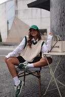 Maglione smanicato a trecce