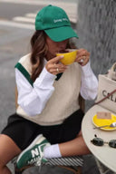 Maglione smanicato a trecce