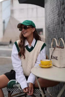 Maglione smanicato a trecce