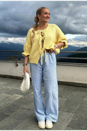 Cardigan con fiocco