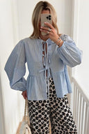 Blusa a righe sottili