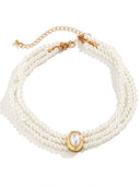 Collana corta con perle finte e perline turchesi