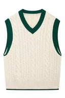 Maglione smanicato a trecce