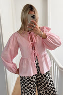 Blusa a righe sottili