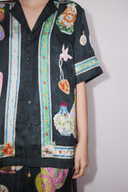 Conjunto de pantalones y blusa con estampado de jarrón Philomène de cuello en V