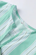 Shorts a righe e camicetta