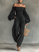 Damen-schulterfreier Jumpsuit mit langen Ärmeln und plissiertem Stoff