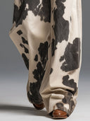 Retro und modische Westernhose mit Kuhmuster