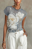 Blå chiffonbluse med blomstermønster
