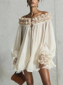 Robe crème à fleurs en 3D