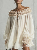 Robe crème à fleurs en 3D