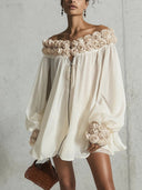 Robe crème à fleurs en 3D