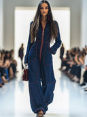 Combinaison décontractée ample rétro en denim rouge avec surpiqûres, jambes larges et manches longues