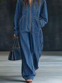 Lässiger weiter Retro-Jeans-Jumpsuit mit Kapuze, Reißverschluss, Taschen und langen Ärmeln