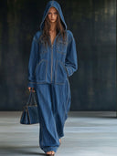 Lässiger weiter Retro-Jeans-Jumpsuit mit Kapuze, Reißverschluss, Taschen und langen Ärmeln