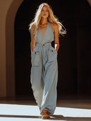 Lässiger Retro-Jumpsuit aus grau-blauem Tencel-Jeansstoff mit Taschen