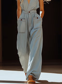 Lässiger Retro-Jumpsuit aus grau-blauem Tencel-Jeansstoff mit Taschen