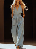 Lässiger Retro-Jumpsuit aus grau-blauem Tencel-Jeansstoff mit Taschen